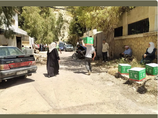 مركز الملك سلمان للإغاثة يوزع 1179 سلة غذائية ويخفف معاناة أهالي ريف دمشق